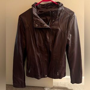 Red/brown leather jacket with some stretch. Only worn once.